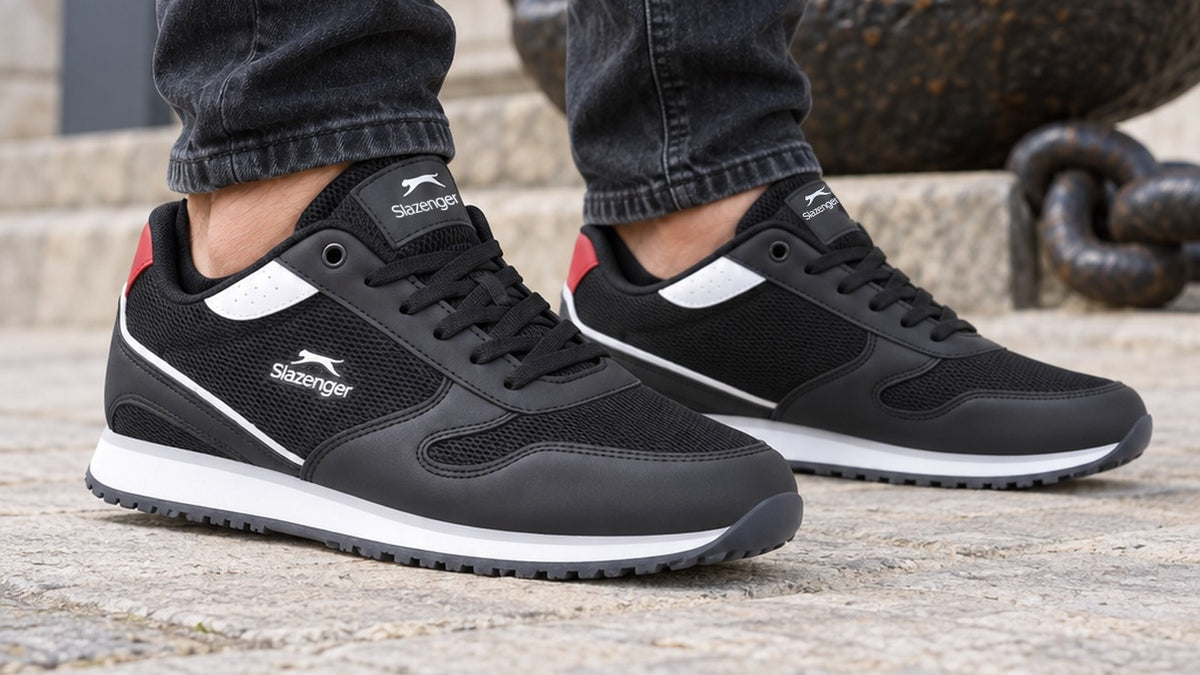 Slazenger Ironics men's sneakers in black and white, worn on foot